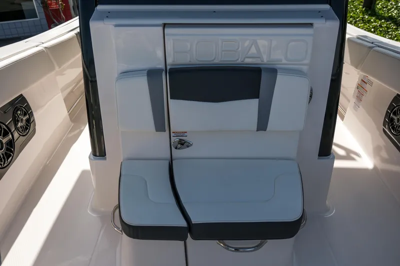Slide: The Image of 2025 Robalo R300 Center Console boat seating with integrated speakers. - 3
