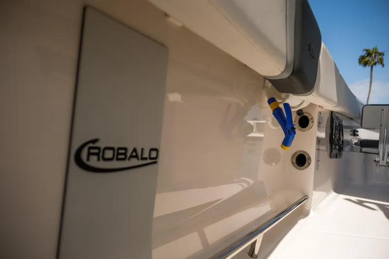 Slide: The Image of 2025 Robalo R300 Center Console boat interior with logo and equipment details. - 32