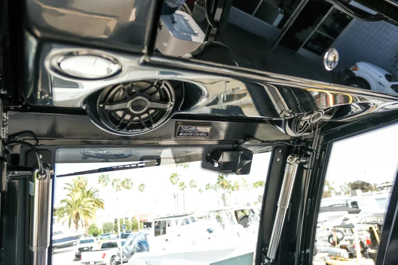 Slide: The Image of Interior view of 2025 Robalo R300 Center Console boat with speaker system. - 40