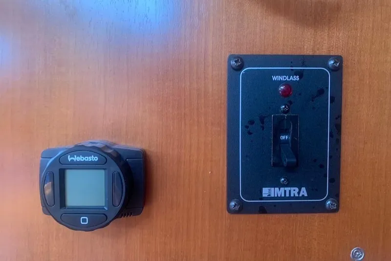 Slide: The Image of Control panel on a 2004 Dufour 34 Performance yacht with Webasto and IMTRA switches. - 24