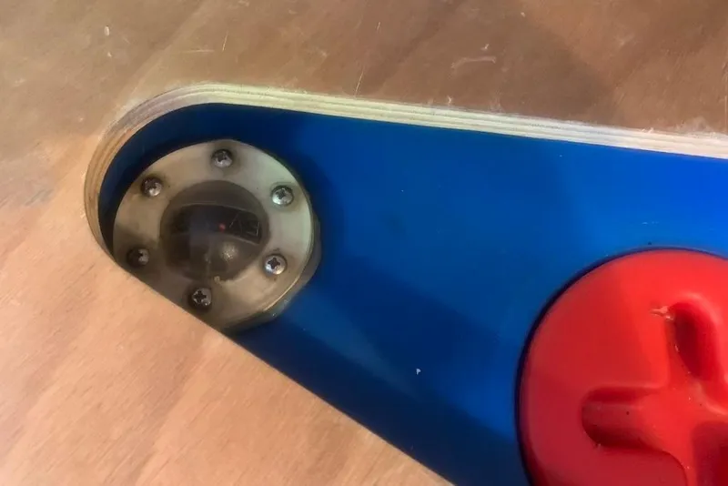 Slide: The Image of Close-up of a Dufour 34 Performance 2004 yacht component with red handle and gauge. - 29