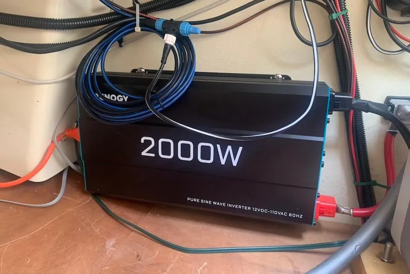 Slide: The Image of 2000W pure sine wave inverter installed on a 2004 Dufour 34 Performance sailboat. - 33