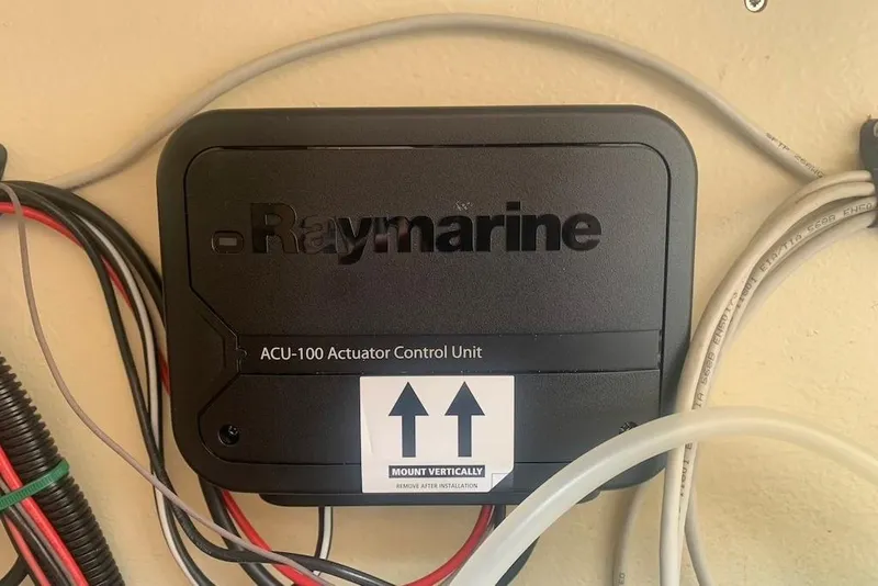 Slide: The Image of Raymarine ACU-100 actuator control unit on Dufour 34 Performance, 2004 model. - 34