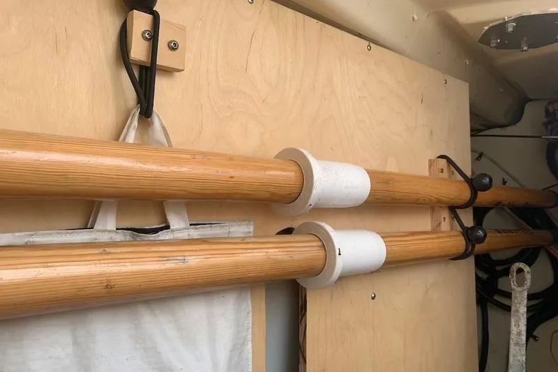 Slide: The Image of Wooden oars stored on a Dufour 34 Performance sailboat, 2004 model. - 37