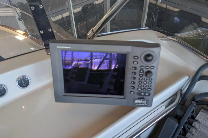 Slide: The Image of Furuno navigation system on 1975 Tollycraft 37 Sedan boat dashboard. - 34