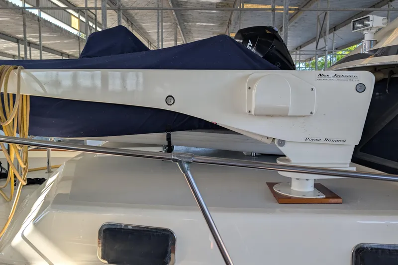 Slide: The Image of 1975 Tollycraft 37 Sedan boat with Nick Jackson power rotation davit system. - 5