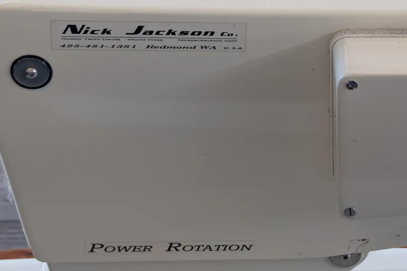 Slide: The Image of 1975 Tollycraft 37 Sedan yacht detail with Nick Jackson Co. label and power rotation feature. - 71