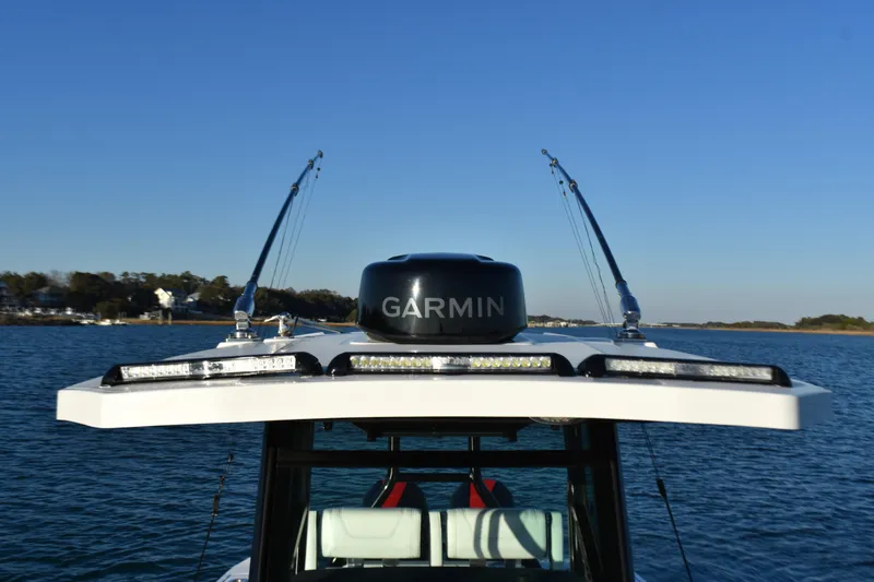 Slide: The Image of 2022 Blackfin 272 CC boat with Garmin equipment on the water. - 16