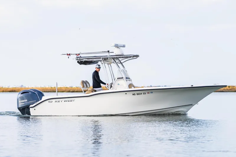 The Image of 2018 Key West 244 Center Console boat on calm water. - 0