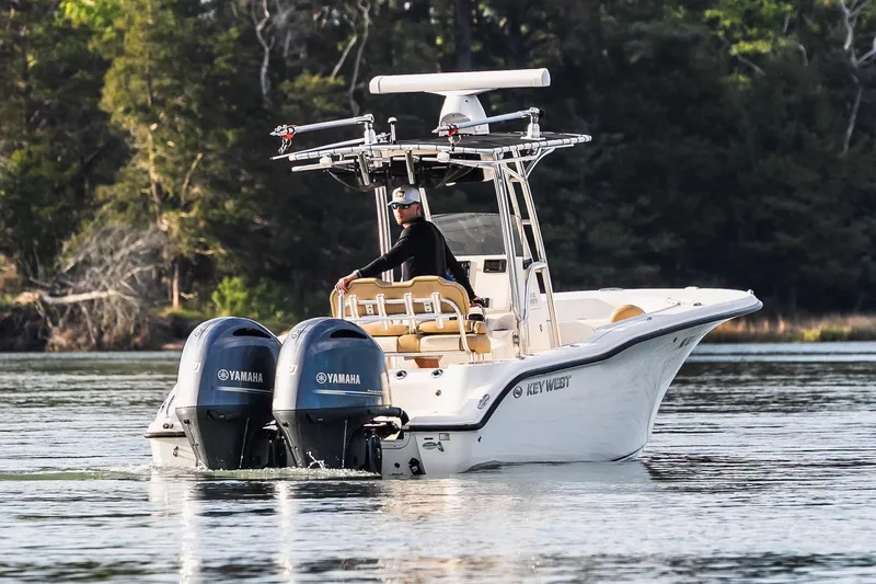 Slide: The Image of Key West 244 Center Console boat on calm water, 2018 model. - 5