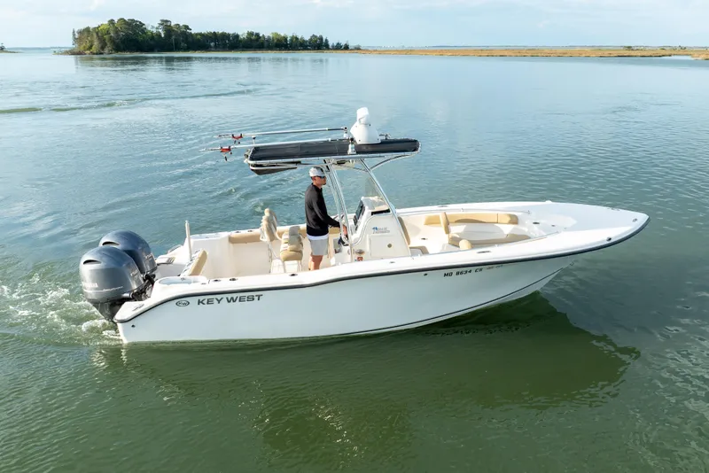 Slide: The Image of 2018 Key West 244 Center Console boat on calm waters. - 6