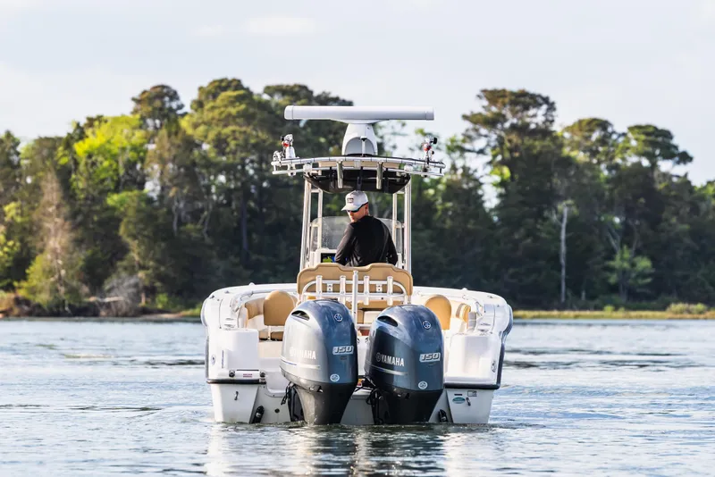 Slide: The Image of 2018 Key West 244 Center Console boat on calm water. - 8