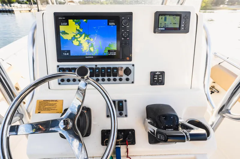 Slide: The Image of Key West 244 Center Console 2018 with Garmin navigation system. - 9