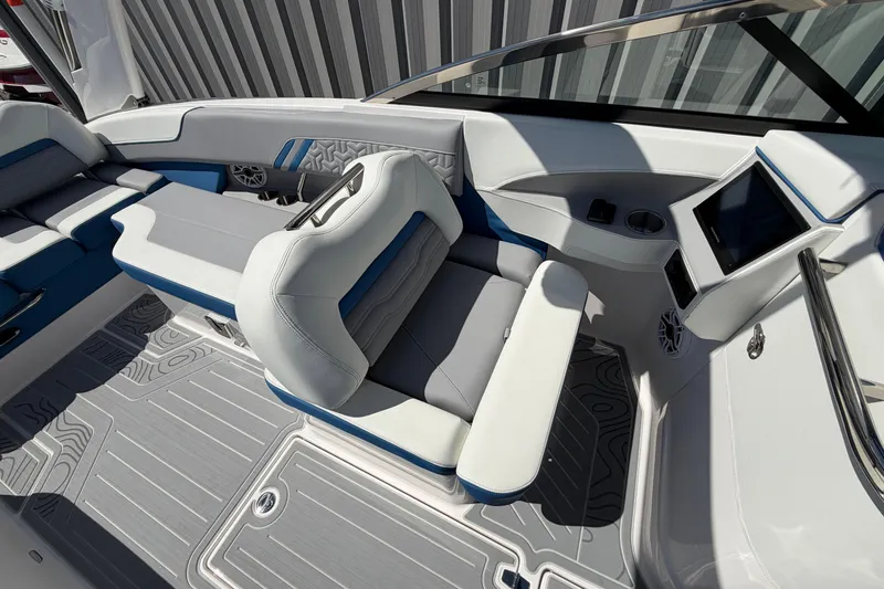 Slide: The Image of Interior of 2026 Regal LS6 Surf boat with modern seating and dashboard design. - 3