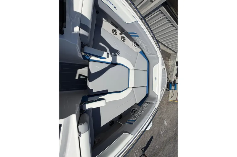 Slide: The Image of 2026 Regal LS6 Surf boat interior with sleek seating and modern design. - 9