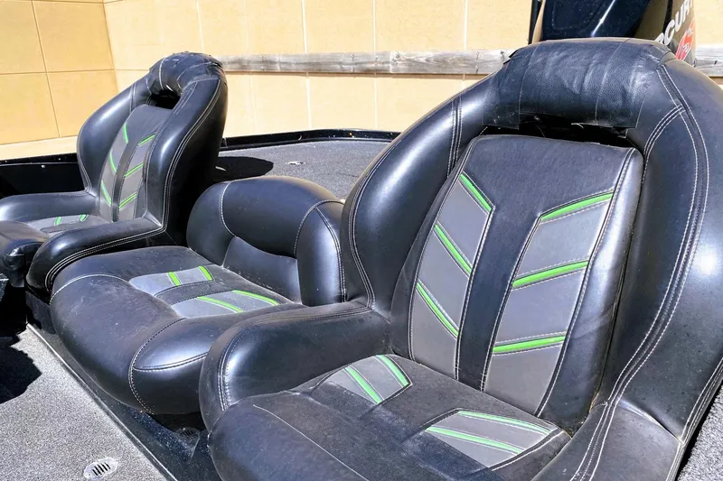 Slide: The Image of 2017 Nitro Z19 boat seats with black and green accents, showcasing modern design. - 12