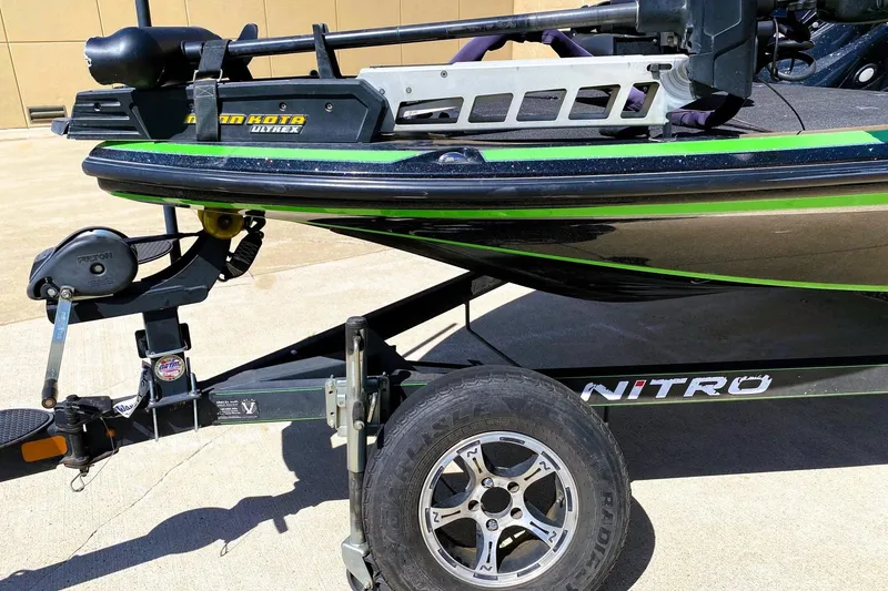 Slide: The Image of 2017 Nitro Z19 boat on trailer with Minn Kota trolling motor. - 3