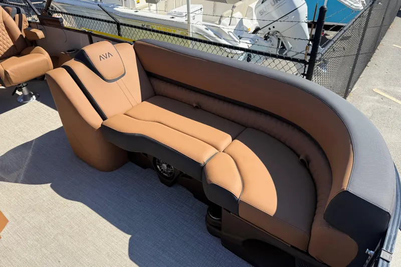 Slide: The Image of Luxurious seating on 2026 Avalon Catalina Quad Lounge boat, featuring elegant brown upholstery. - 11
