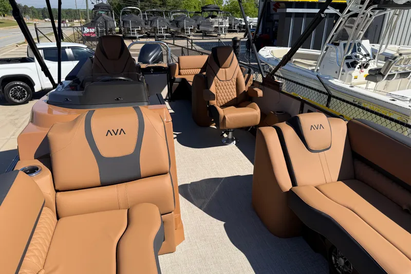 Slide: The Image of Luxurious interior of 2026 Avalon Catalina Quad Lounge boat with tan seating and modern design. - 12