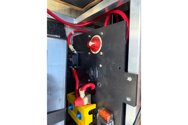 Slide: The Image of Electrical panel with red cables in 2026 Avalon Catalina Quad Lounge boat. - 35