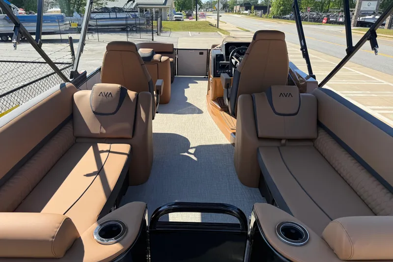 Slide: The Image of Luxurious interior of 2026 Avalon Catalina Quad Lounge boat with tan seating and modern design. - 42