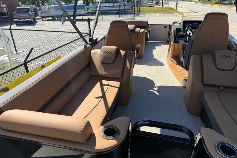 Slide: The Image of Luxurious interior of 2026 Avalon Catalina Quad Lounge boat with tan seating and modern design. - 43