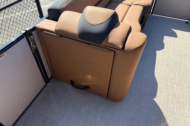 Slide: The Image of Luxurious seating on 2026 Avalon Catalina Quad Lounge boat, featuring premium brown upholstery. - 52