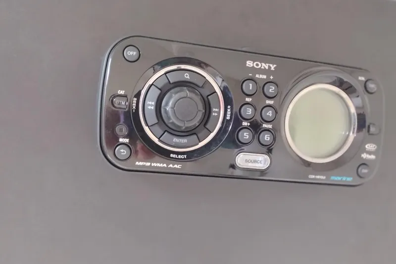 Slide: The Image of Sony marine audio system on 2013 Sea Ray 300 SLX boat dashboard. - 24