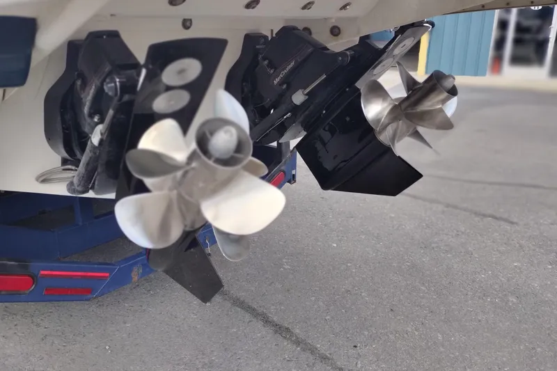 Slide: The Image of Propellers of a 2013 Sea Ray 300 SLX boat on a trailer. - 6