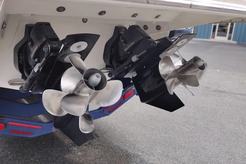 Slide: The Image of Dual propellers on a 2013 Sea Ray 300 SLX boat, showcasing sleek design. - 8