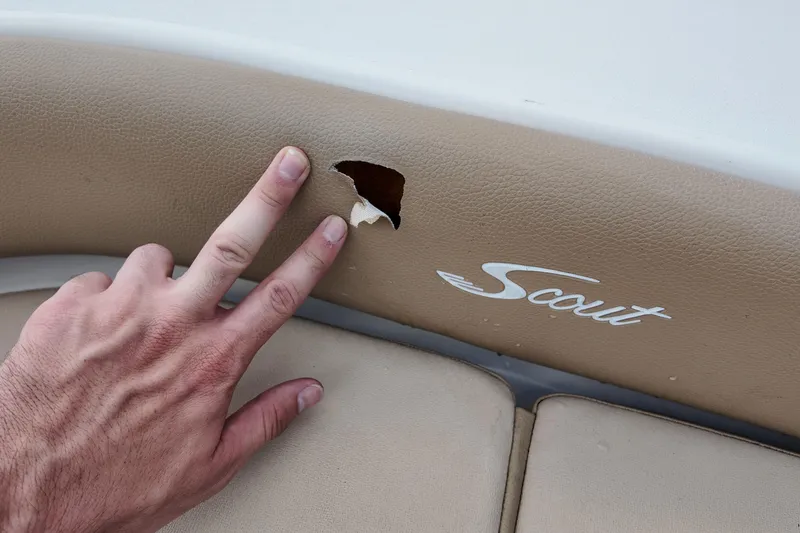 Slide: The Image of 2021 Scout 251 XSS boat seat with tear and visible logo. - 17