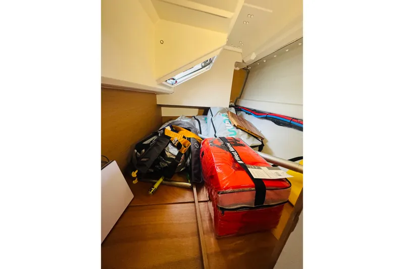 Slide: The Image of Interior storage space of 2024 Jeanneau Sun Odyssey 349 sailboat with equipment. - 69