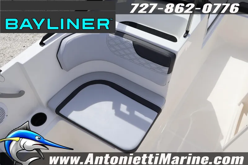 Slide: The Image of 2026 Bayliner Element M17 boat interior with seating, cup holder, and branding details. - 10