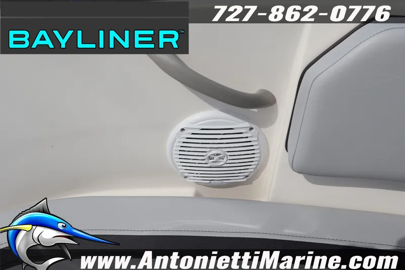 Slide: The Image of Bayliner Element M17 boat interior with speaker, logo, and contact information. - 21