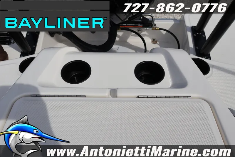 Slide: The Image of 2026 Bayliner Element M17 boat dashboard with cup holders, Antonietti Marine branding. - 22