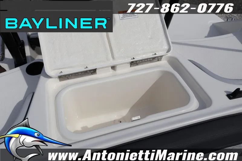 Slide: The Image of Open storage compartment on 2026 Bayliner Element M17 boat, featuring Antonietti Marine branding. - 23