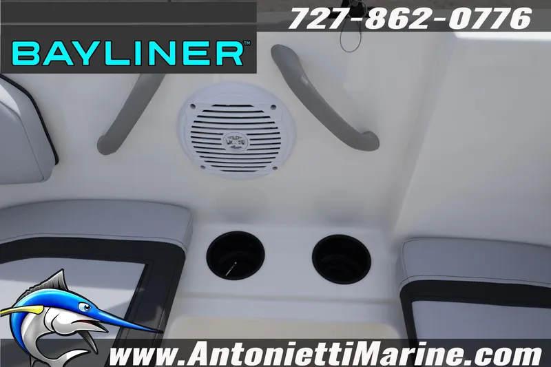 Slide: The Image of 2026 Bayliner Element M17 boat interior with speaker and cup holders. - 26