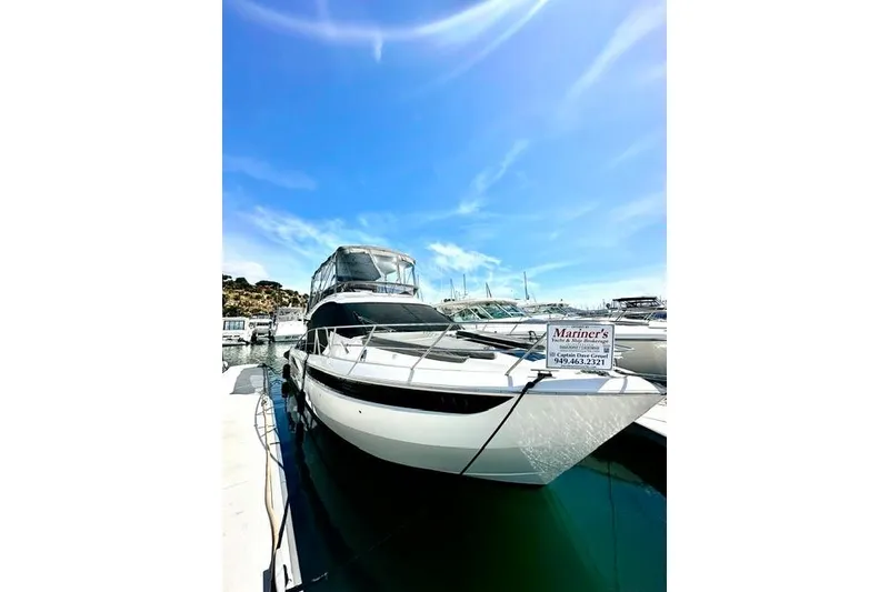 The Image of 2018 Galeon 420 Fly yacht docked under clear blue skies. - 0