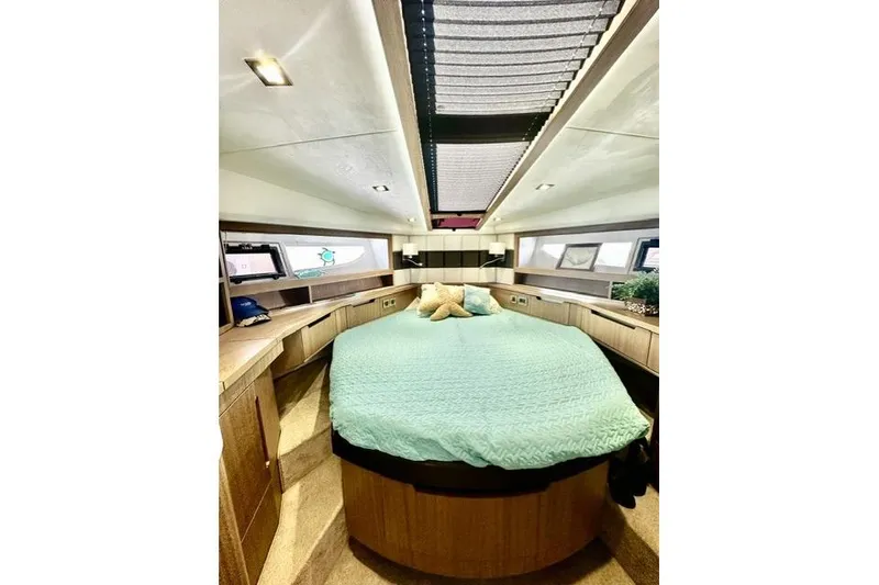 Slide: The Image of Luxurious cabin interior of 2018 Galeon 420 Fly yacht with skylight and cozy bedding. - 10