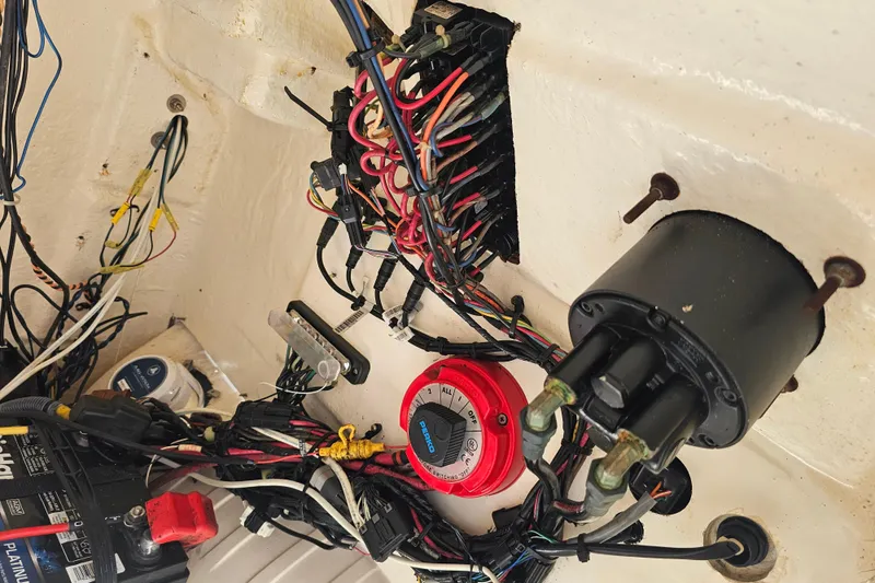 Slide: The Image of Electrical wiring and components inside a 2005 Mako 212 Center Console boat. - 41