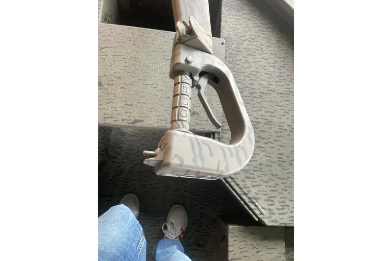 Slide: The Image of Camouflage-patterned handle of War Eagle 750 Gladiator, 2026 model, with textured flooring background. - 14
