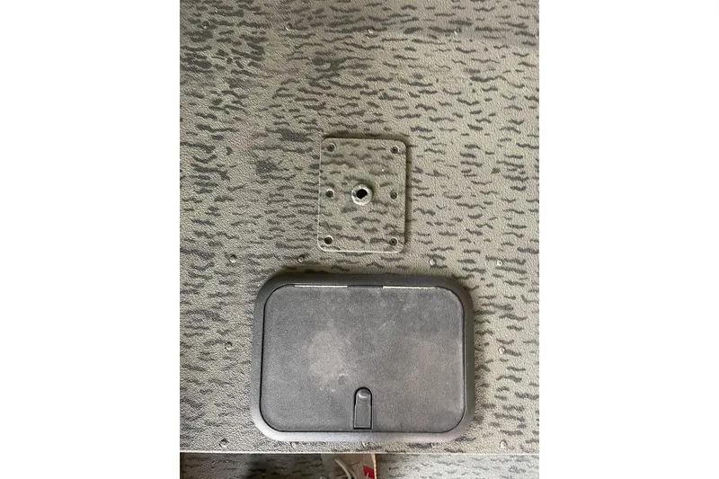 Slide: The Image of Camouflage-patterned surface with a hatch on a 2026 War Eagle 750 Gladiator. - 16