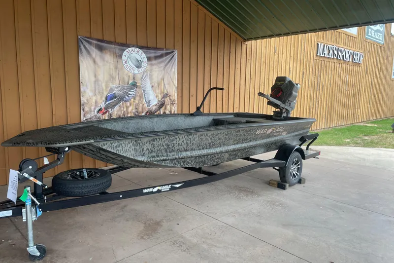 The Image of 2026 War Eagle 750 Gladiator boat on trailer at Mack's Sport Shop. - 4