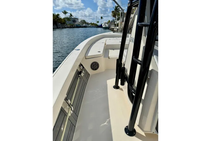 Slide: The Image of 2021 Pathfinder 2400 TRS boat interior, featuring sleek design and waterfront view. - 5