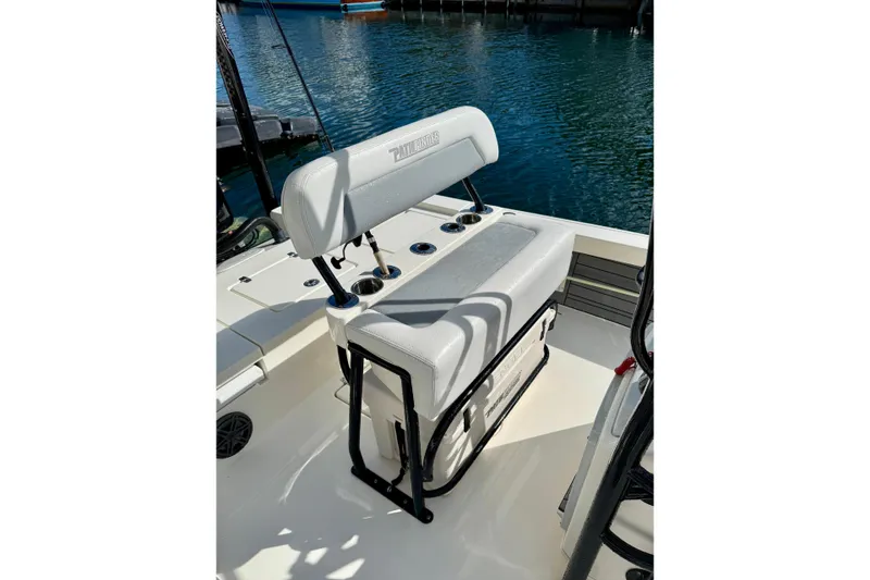 Slide: The Image of 2021 Pathfinder 2400 TRS boat interior with seating and rod holders. - 8