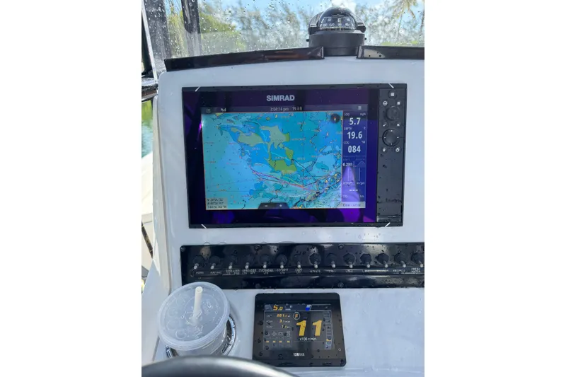 Slide: The Image of Boat dashboard with navigation screen on 2021 Pathfinder 2400 TRS. - 9