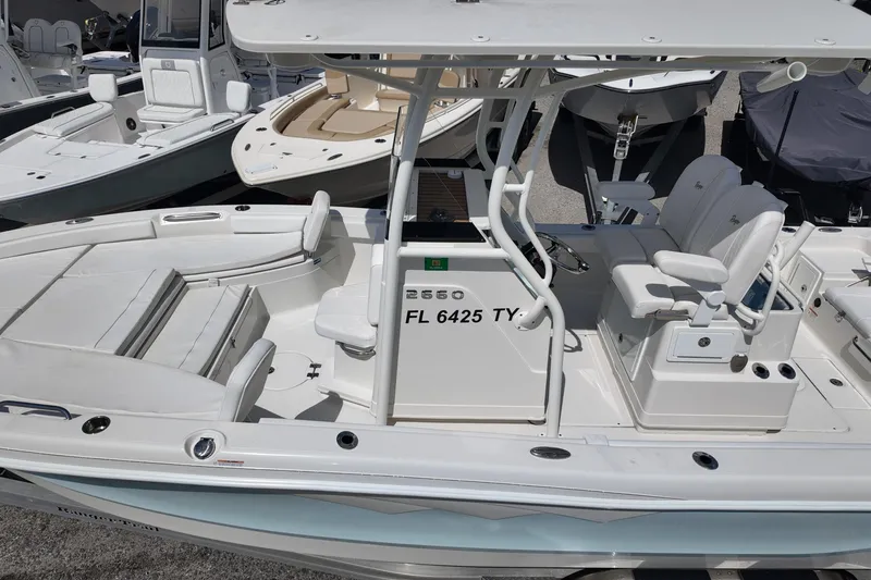 Slide: The Image of 2024 Ranger 2660 Bay boat with sleek design and spacious seating. - 18