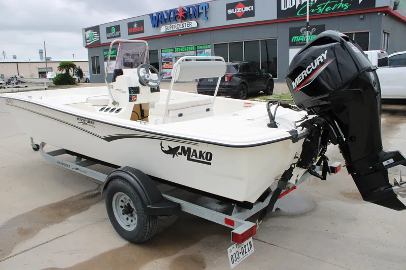 Slide: The Image of 2021 Mako Pro Skiff 17 CC boat with Mercury engine on trailer at dealership. - 10
