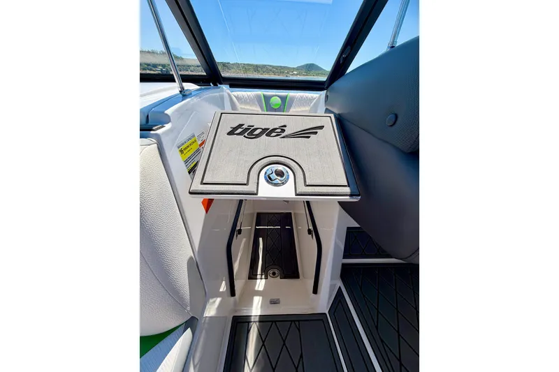 Slide: The Image of 2016 Tigé RZX3 boat interior with branded panel and seating. - 40