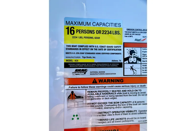 Slide: The Image of 2016 Tigé RZX3 capacity label: 16 persons or 2234 lbs, safety and compliance warnings. - 42